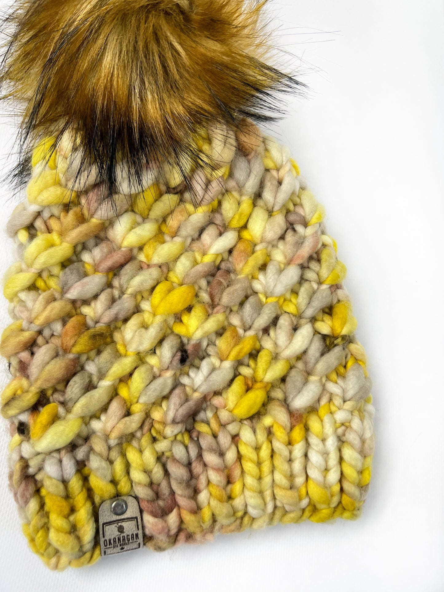 Beautifully soft 100% Hand Dyed Merino Wool knitted toque. Hand Knit in Screeched In colourway with yellow and brown - Okanagan Dye Works